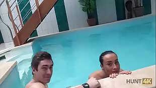 The cuckold swims while the cute non-native girl has fun respecting her doll